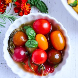 Fermented cherry tomatoes in a bowl.