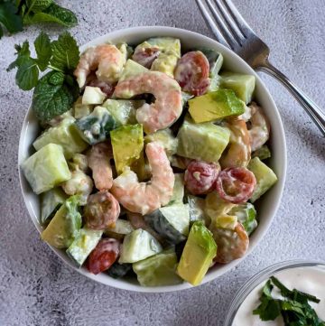 This is a finish dish of shrimpo avocado summer salad.