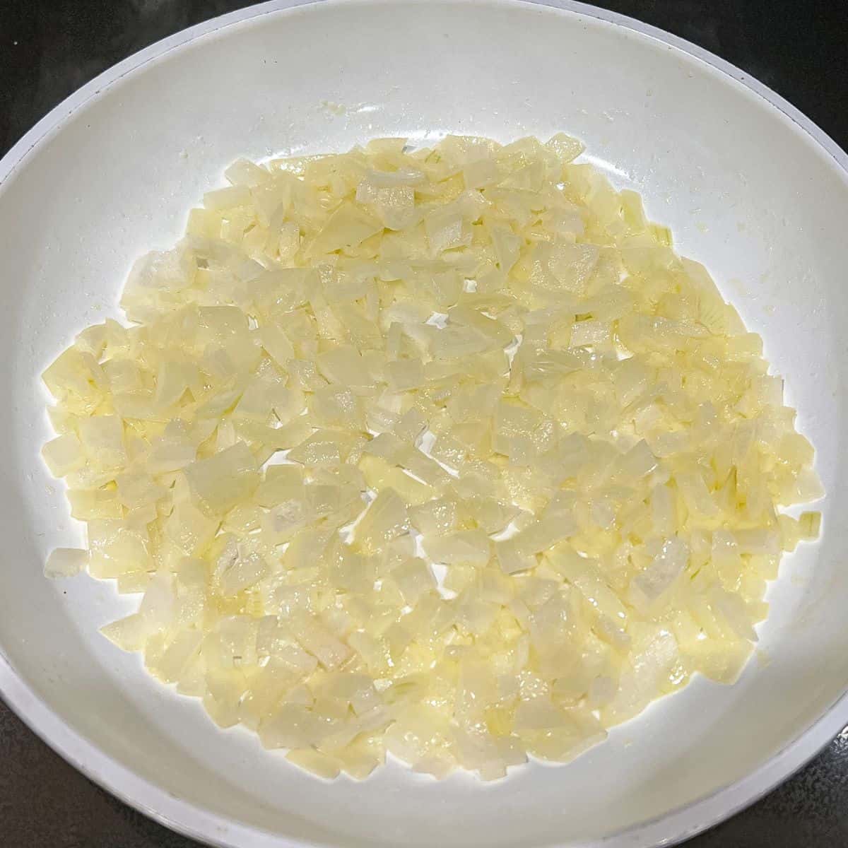 Saute onion until translucent and aromatic.
