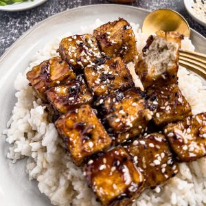 A bite of sweet and sticky tofu nugget.