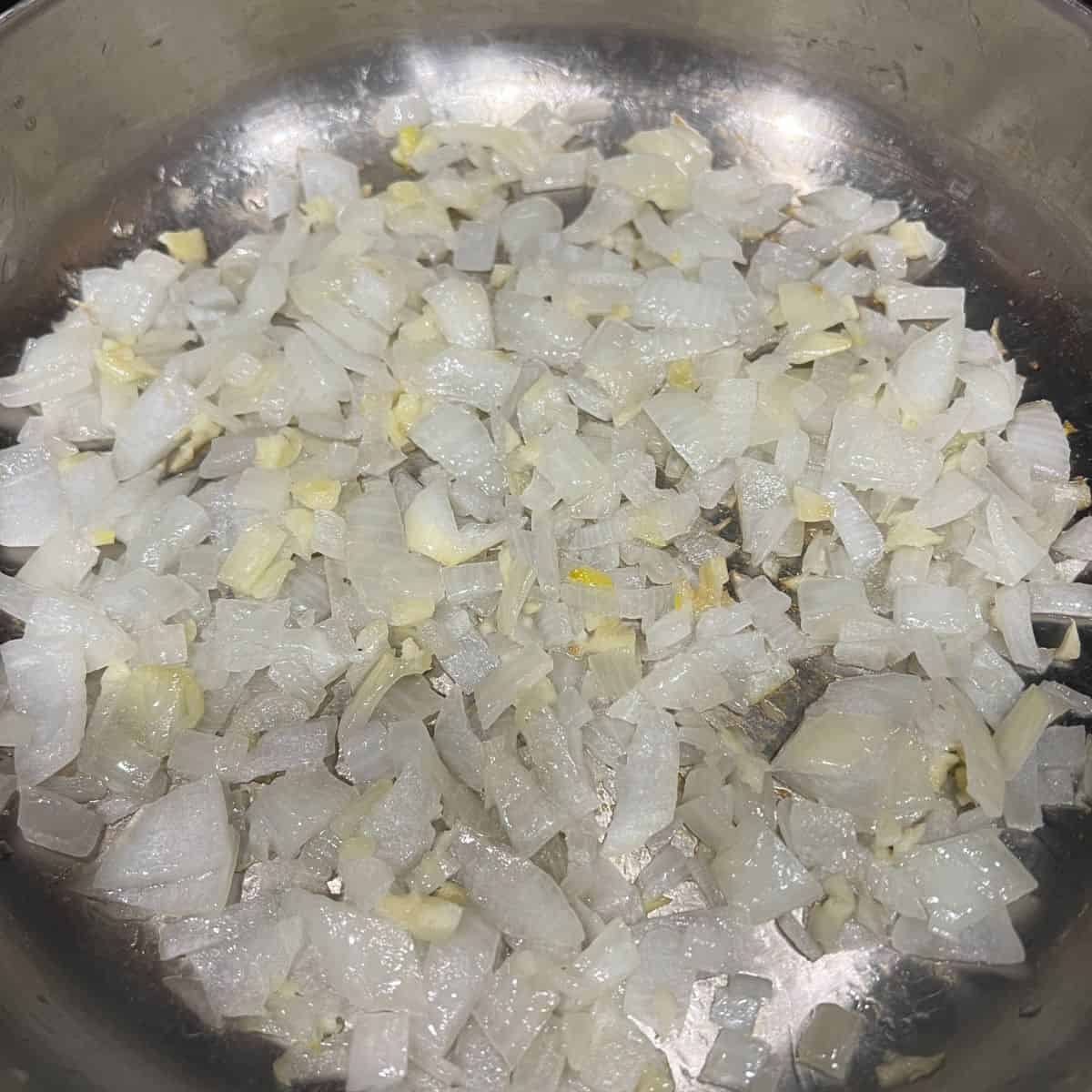 Cooking onion and garlic until soft.