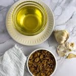 Fried garlic and garlic oil on the table.