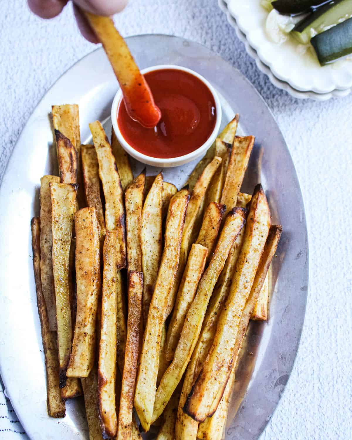 Finish dish of air-fryer sweet potato fries with dipping sauce.