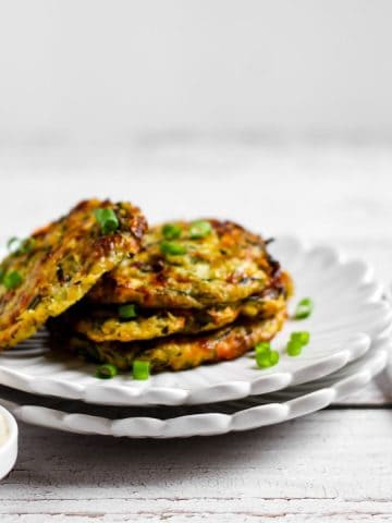 Stacks of cooked zucchini fritters from air-fryer