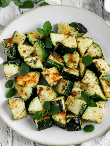 Finish dish of roasted zucchini in a plate.