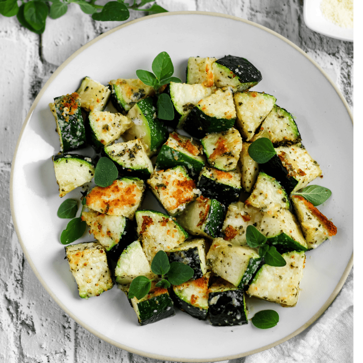 Finish dish of roasted zucchini in a plate.