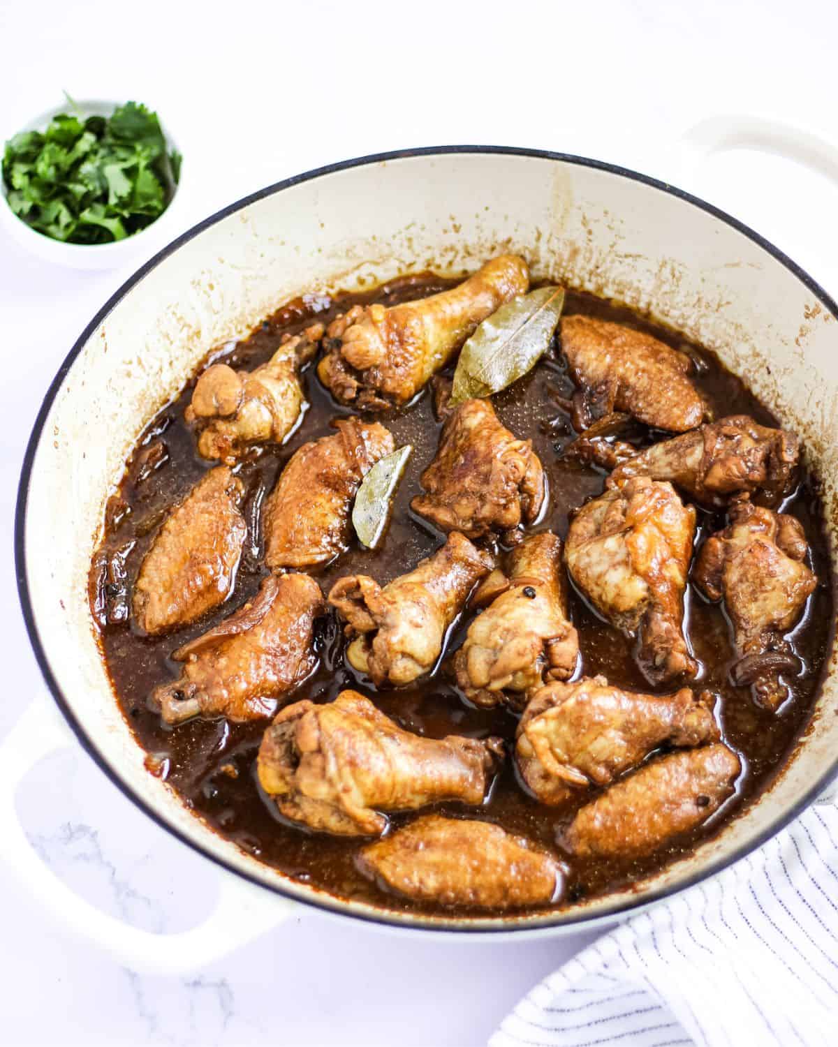 Finish dish of chicken adobo in a skillet ready to serve.