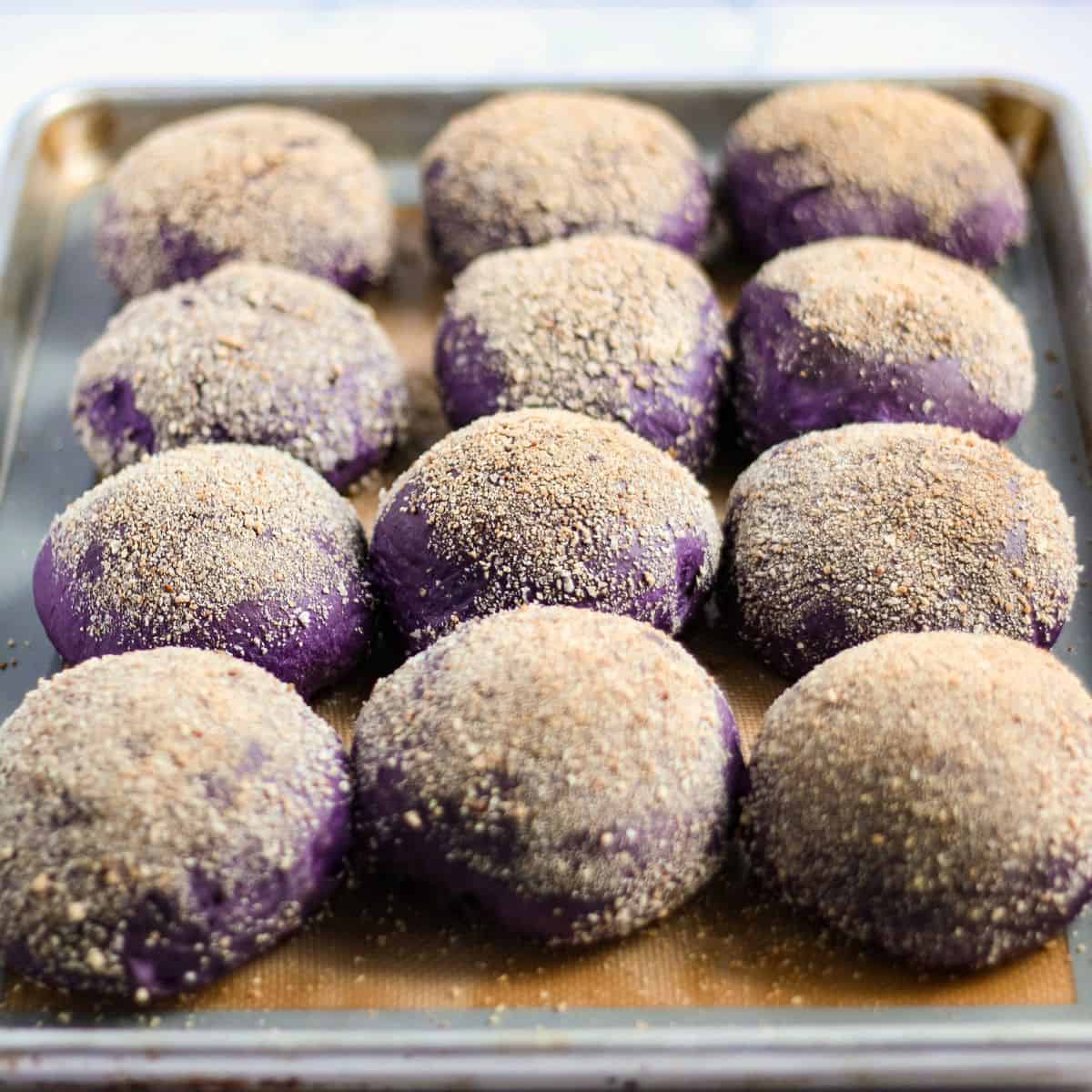 Finish dish of ube cheese pandesal in a baking tray.