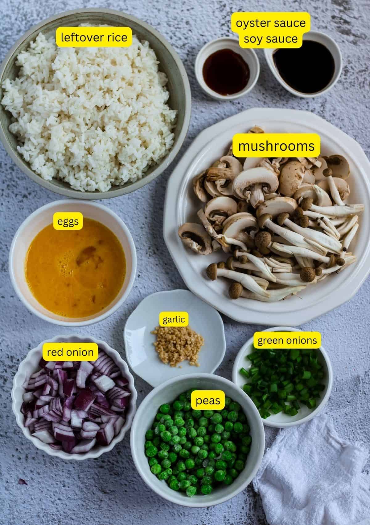 Mushroom egg fried rice ingredients on the table.