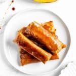 Finish dish of banana turon in a plate.