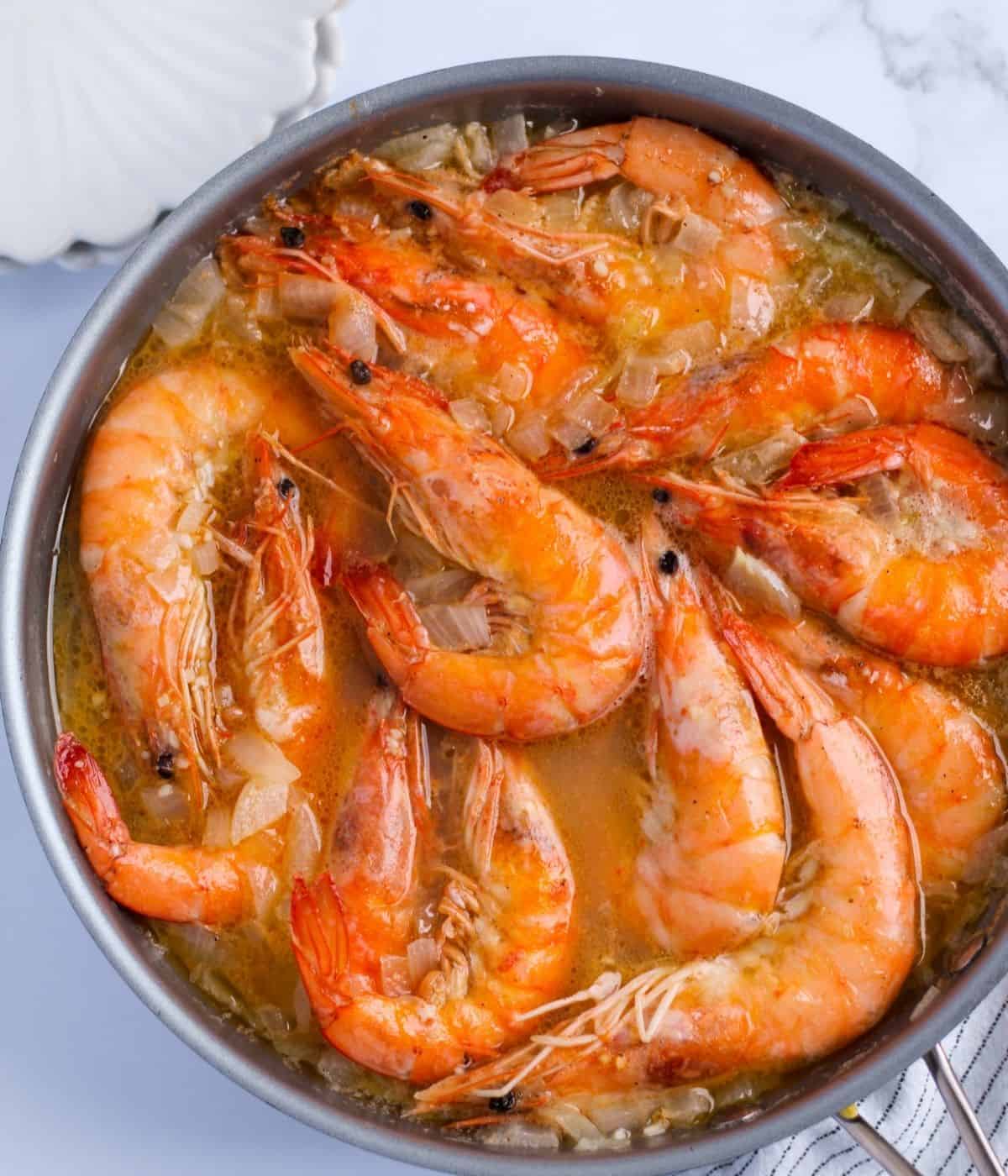 Finish dish of butter shrimp in a skillet.