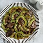 Ampalaya con carne finish dish on a plate.