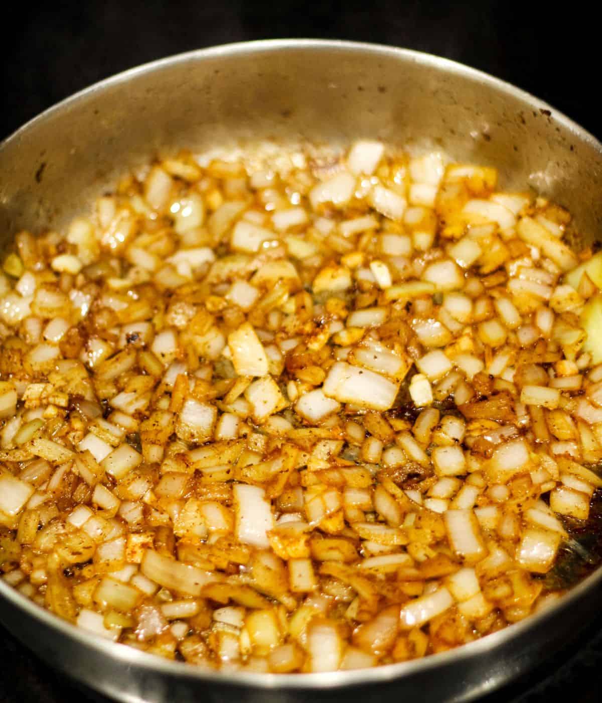 Cooking the garlic and the onion.