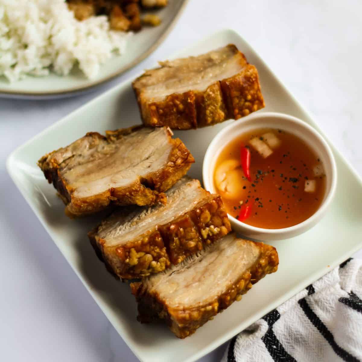 Finish dish of sliced lechon kawali in a plate.