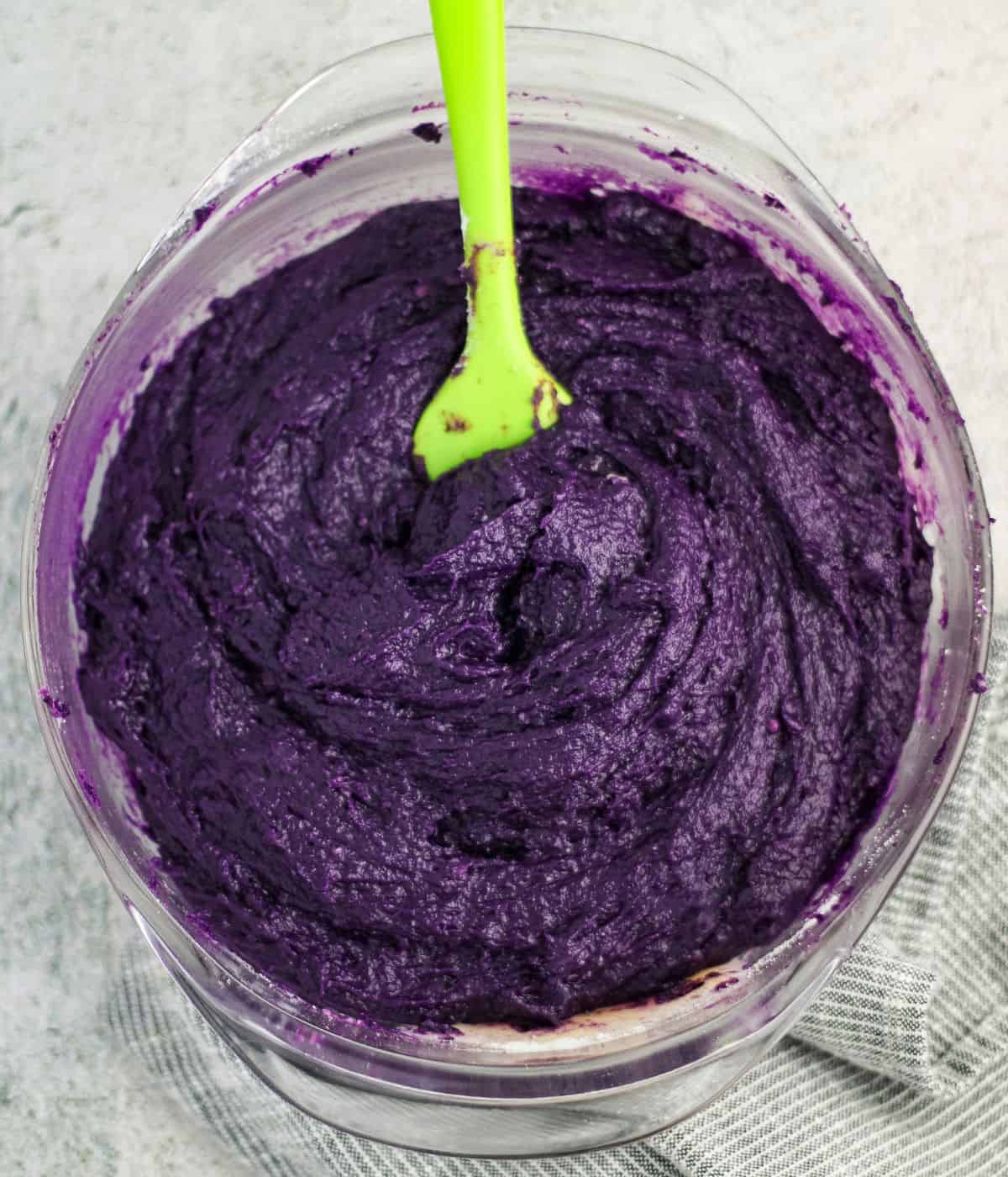Ube brownie batter in a bowl.