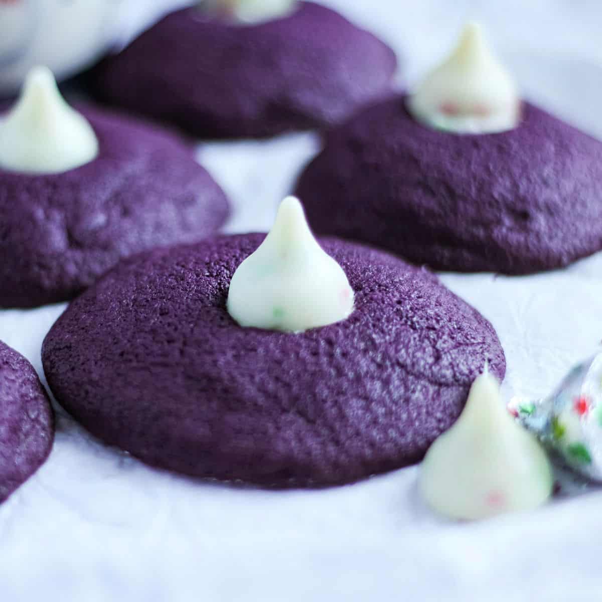 Baked ube cookies with hershey kisses.