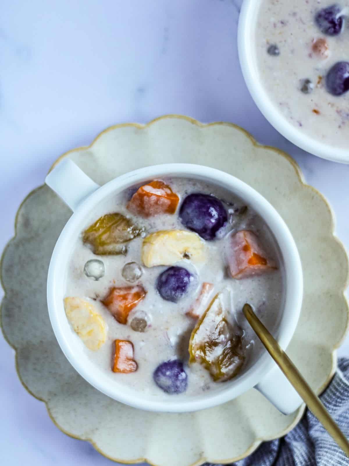 Ginataang bilo-bilo in a bowl with spoon.