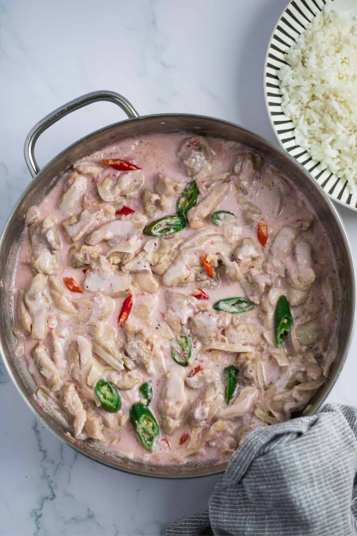 Chicken Bicol express finish dish in a skillet.