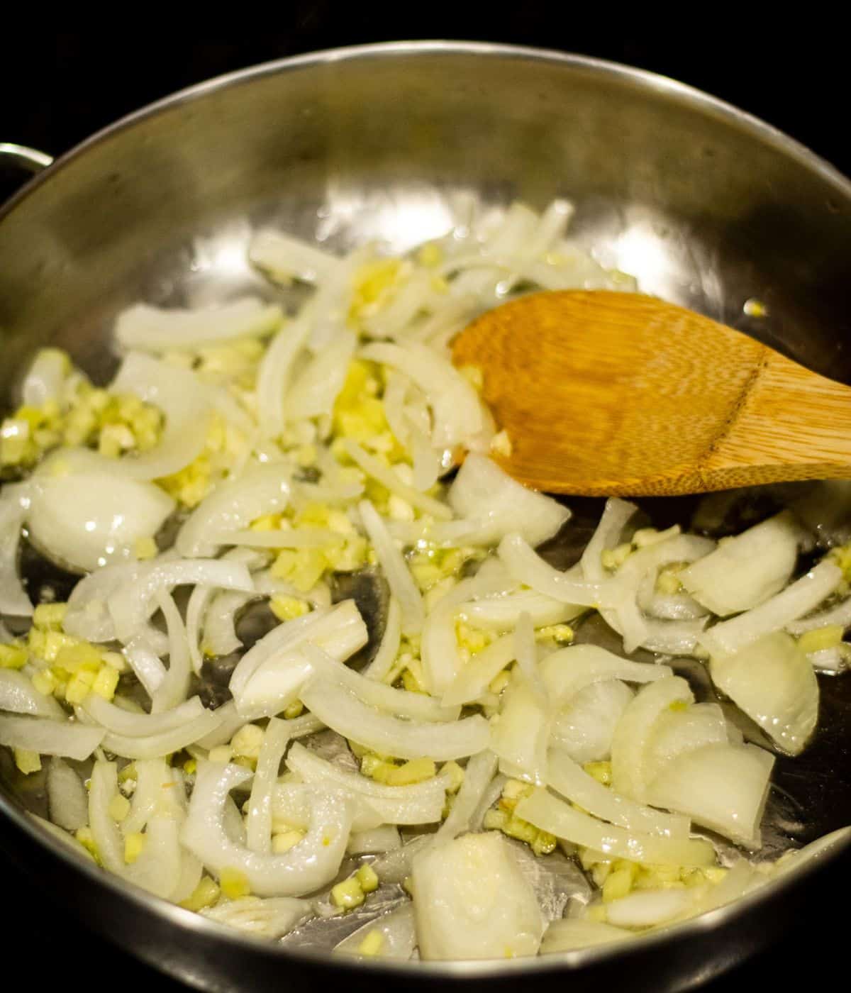 Sauted onion, garlic, and ginger in a skillet.