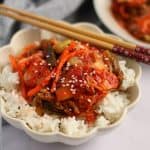 Finish dish of kimchi in a bowl of rice.
