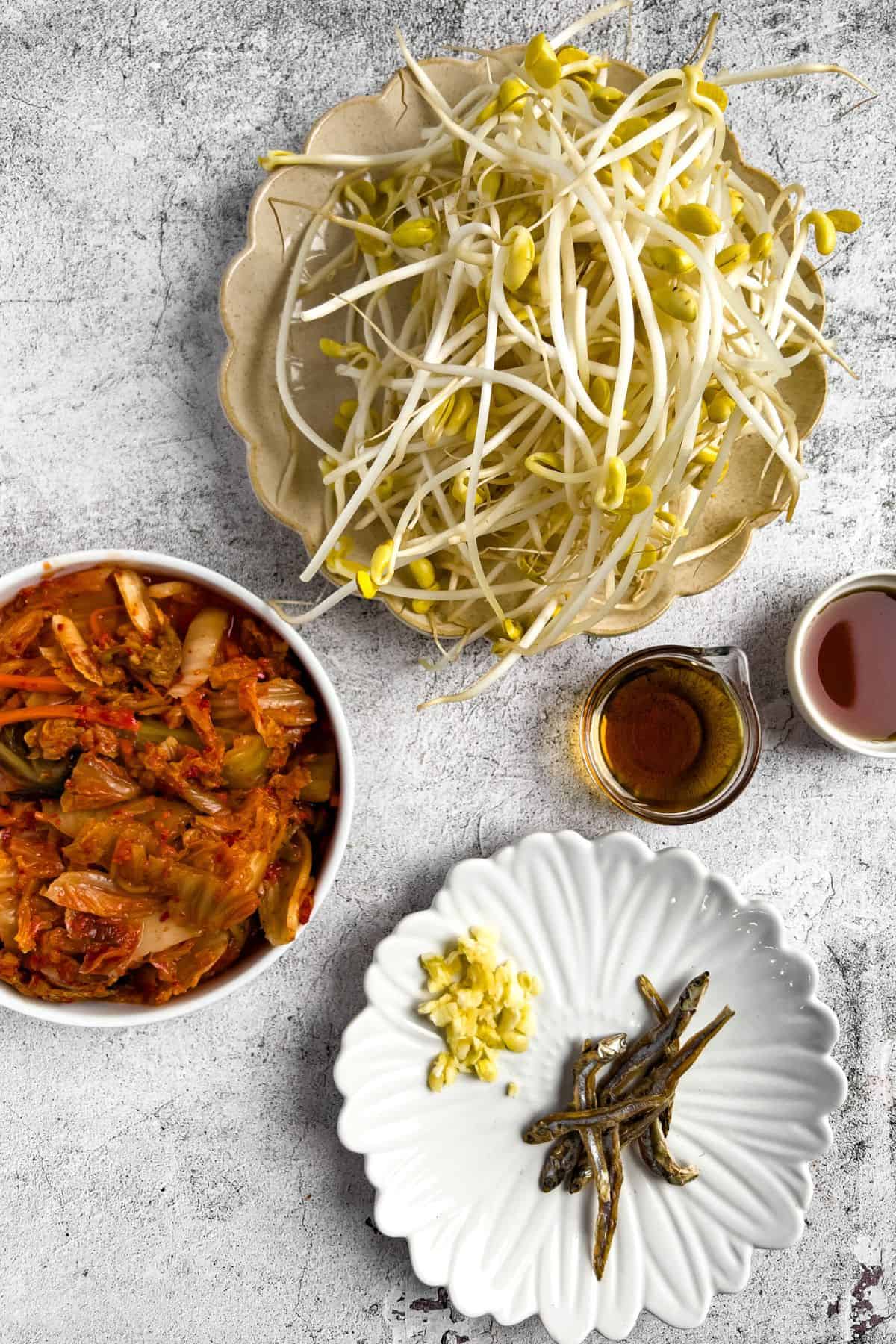 Ingredients for korean soybean sprout kimchi soup.